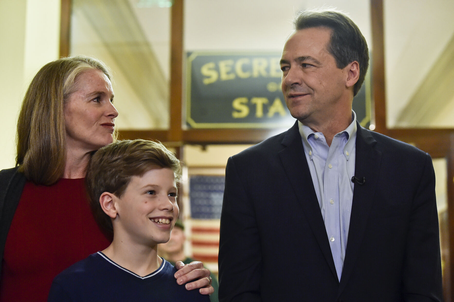 With his family by his side, Montana Gov. Steve Bullock speaks to the press